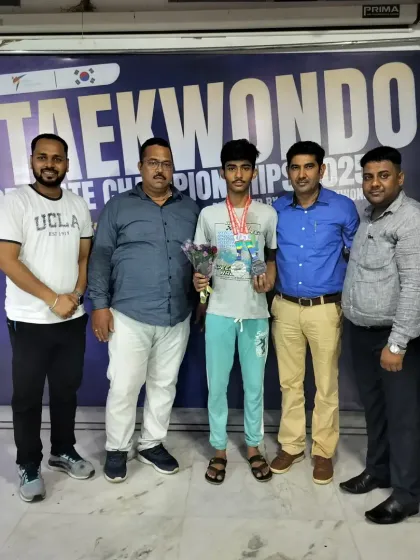 Celebrating with our dual-medalist from the Delhi State Championship. His success in both sparring and forms is a testament to our comprehensive training.