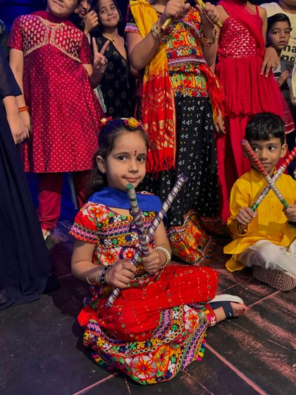 An adorable moment from our Navratri celebration, featuring our youngest dandiya performers.