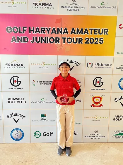 Aaradhya taking the runner-up trophy at the Golf Haryana tour. This healthy competition between them pushes both to get better every day.