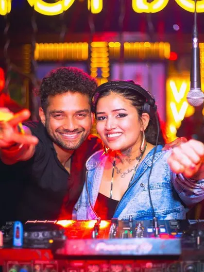 Posing for a picture with a guest during my set.