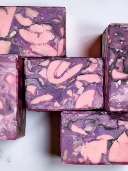 My "Lilac Blooms" soap, an entry for a marbled soap technique challenge. I used three colors and gold mica veins to create a pattern that looks like petals frozen in stone.