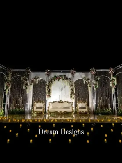 For the reception, I love creating a dramatic "wow" moment. This magnificent stage combines architectural arches, shimmering crystal curtains, and a candlelit mirrored floor to produce a truly unforgettable, high-impact setting for the evening's celebration.