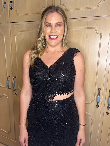 Erica looking confident and party-ready. I styled her hair in soft waves to complete the glamorous look.