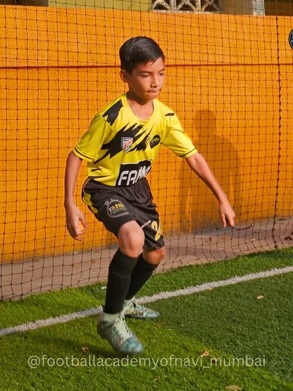A player practices defensive footwork, staying low and ready to react to an opponent's move.