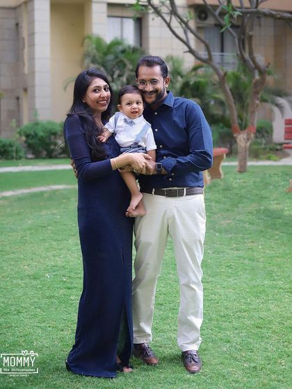 These standing portraits show the beautiful bond between parents and their baby boy during a lovely outdoor family session in a Delhi-Gurgaon park.