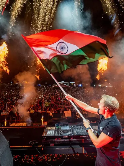 A truly iconic moment of pride and unity. Trance legend Armin van Buuren holding the Indian flag high above the decks, with flames and fireworks erupting behind him. These are the powerful, emotional connections we forge between artists and fans.