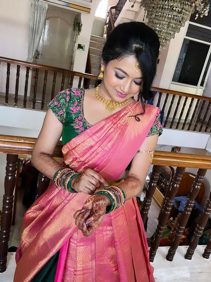 The half-up hairstyle is perfect for keeping the hair off the face while still looking elegant.