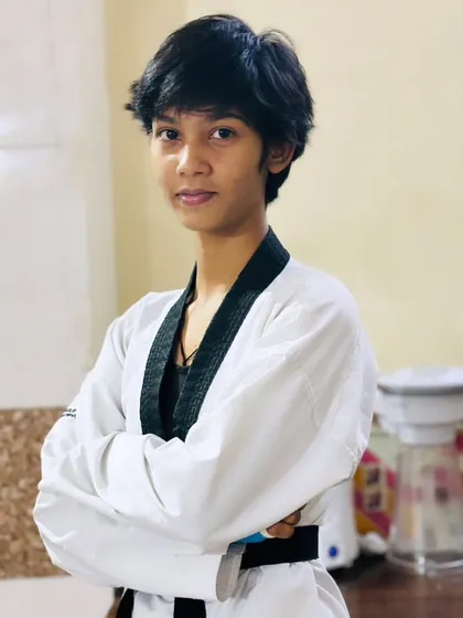 A portrait of one of our dedicated female fighters. Strength and determination shine through.