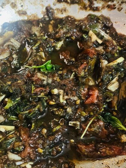 Another look at the fermented crab chutney, showing its dark colour and moist texture. It's an acquired taste but a true delicacy.