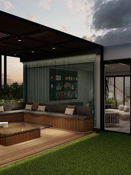 Showcasing the connection between the open-air pergola deck and the enclosed glass lounge. This design offers the flexibility of both sheltered and open seating options on the same terrace.