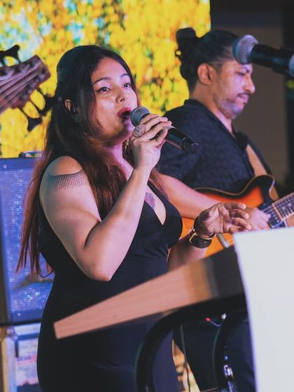 A close-up shot from our performance for KLM Airlines. As a lead vocalist, I focus on connecting with the audience and delivering a heartfelt performance.