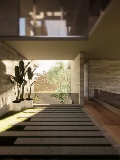 A rendering of a residential interior, exploring the use of exposed concrete and natural light. A walkway of stone pavers set in grass brings the landscape directly into the home.