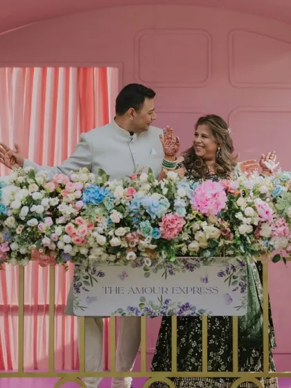The happy couple enjoying their custom-made 'Jab We Met' installation. Seeing their story come to life is what makes our work so rewarding.