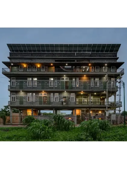 The ASA Office in Bhopal stands as a testament to ecological design on an institutional scale. This building, raised on stilts to create a natural wetland below, is powered by solar energy and built with locally made composite blocks, showcasing how modern workspaces can be both functional and deeply connected to nature.