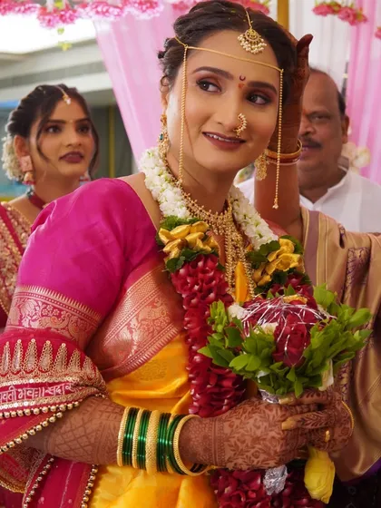 A beautiful candid moment of the bride during her wedding ceremony. The natural, glowing makeup ensures she looks her best without feeling heavy or overdone.
