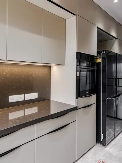 A close-up of the tall unit in our Kandivali project, showing the seamless integration of the built-in oven and refrigerator.