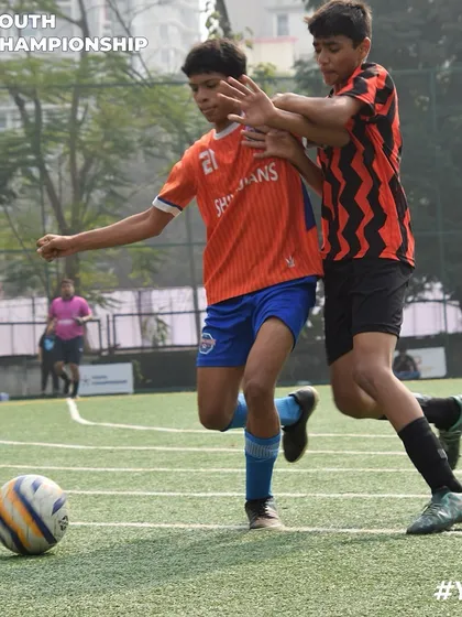 A physical challenge for the ball during the Youth Championship 2024. Our player stands strong to maintain possession.