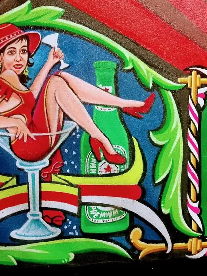 Another angle of the woman in the martini glass, with the client's name, Jesse Gordon, painted above.