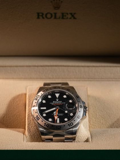 A full view of the Rolex Explorer II in its box. This shows the complete package you receive when you cop a watch from us, ensuring its provenance and resale value.