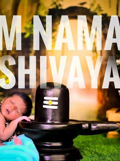 A newborn sleeping peacefully next to a Shiva Linga, a serene and divine portrait.