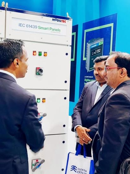 My team discussing smart panel solutions with visitors at the Middle East Energy 2025 expo in Dubai.