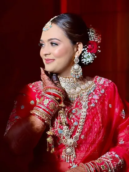 Another angle of this beautiful bride, showing how the makeup looks stunning from every perspective, with a focus on radiant skin.