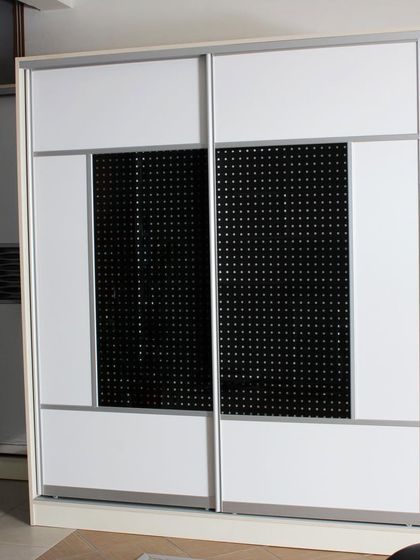 Our process is simple. We start with a design consultation, then manufacture your custom wardrobe in our factory, and finally, our expert team delivers and installs it for you.