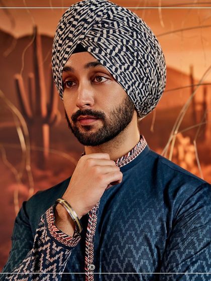 The Altruist Kada, styled on a model, showcasing its sleek and timeless appeal. This piece is perfect for daily wear or for adding a finishing touch to a festive outfit.