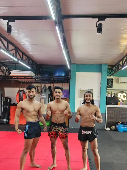 Three of our dedicated fighters, showing the results of consistent training and a disciplined lifestyle.
