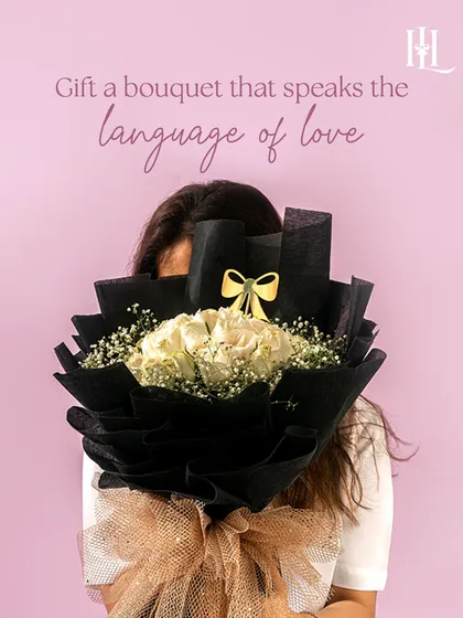A bouquet that speaks the language of love. This stunning arrangement of white roses is perfect for expressing your heartfelt emotions on Valentine's Day.