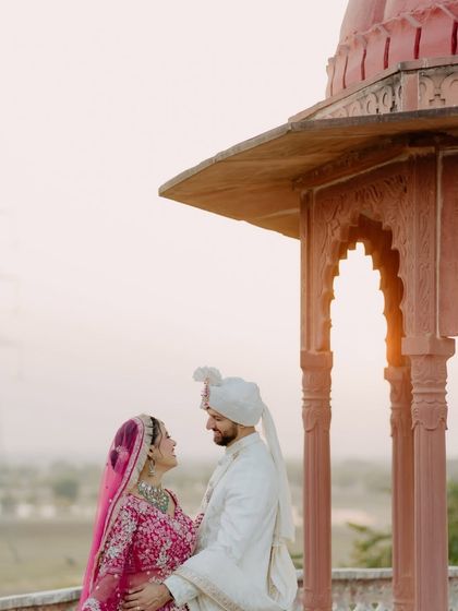 A romantic shot against the sunset. The golden light perfectly captured the warmth and love we felt.