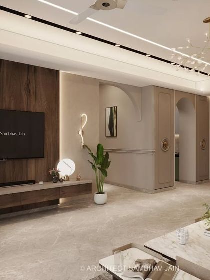 This living space exudes a serene yet luxurious ambiance. From the warm wooden paneling and marble-inspired finishes to the graceful arches and biophilic touches, every detail is curated to perfection.