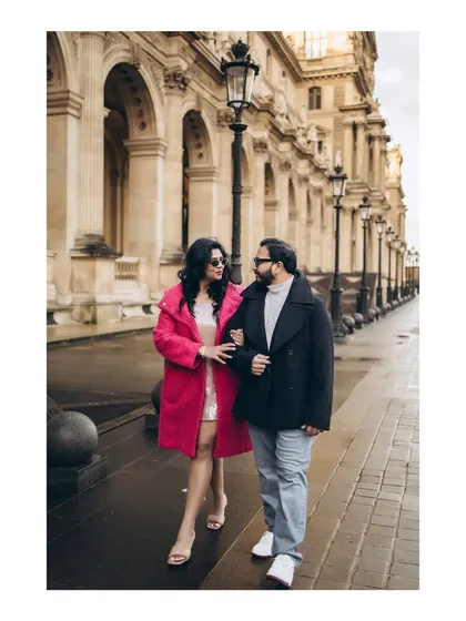 A romantic stroll arm-in-arm through Paris. This pre-wedding shoot captures the effortless elegance and connection between the couple.