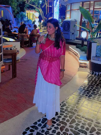 Taking a moment to soak in the beautiful festive decor and atmosphere during a Navratri night out.