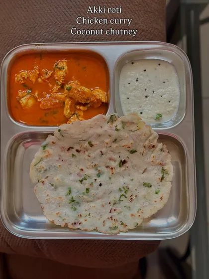 A traditional Karnataka meal of akki roti (rice flatbread) with chicken curry and coconut chutney. It shows that local cuisines can be perfectly healthy.