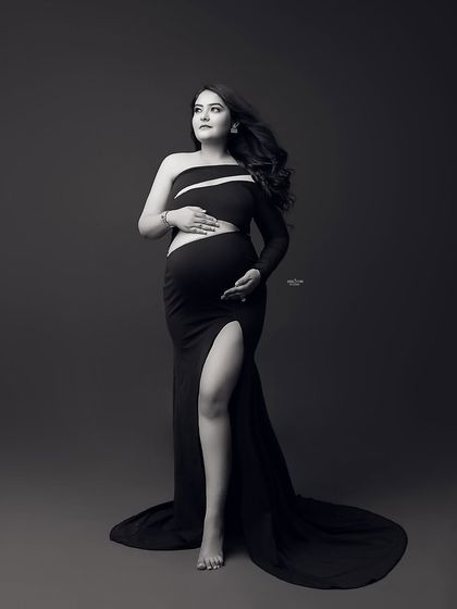 A powerful black and white portrait that uses shadows and highlights to sculpt the body. This is a key technique for creating dramatic and artistic images.