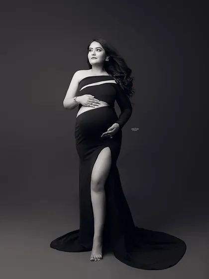 A powerful black and white portrait that uses shadows and highlights to sculpt the body. This is a key technique for creating dramatic and artistic images.