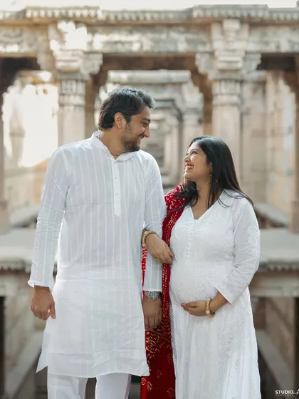 An outdoor shot filled with happiness and natural light. Walking together, sharing a smile, these are the simple moments that make the best memories.