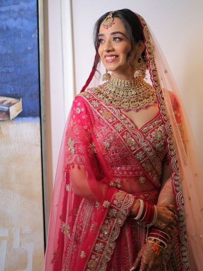 Shivangi looked absolutely radiant for her day wedding. I created a minimal makeup look that embraced her natural glow and paired it with her beautiful pink lehenga.