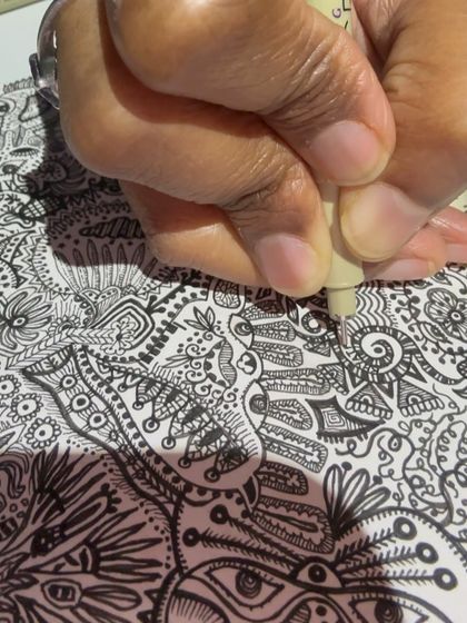 A close-up of my hand, deep in the process of creating 'SOUL-CONNECTIONS.' I use fine archival ink pens to create these incredibly detailed, meditative drawings.