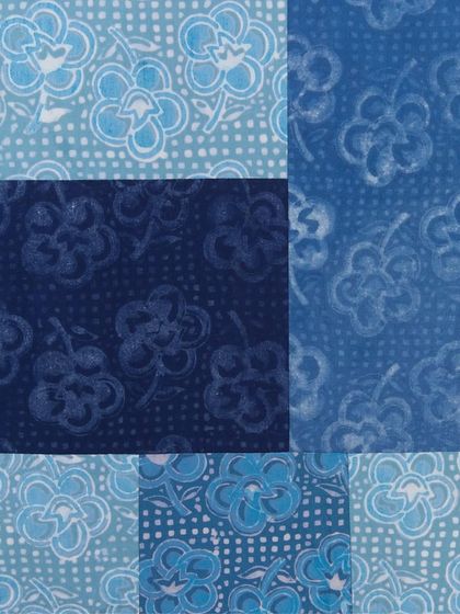 A breezy patchwork dress made for Christy Dawn. Each panel was custom block printed and hand-dyed in natural indigo and butterfly pea flowers, using a 14-step discharge print technique with all-natural plant resins.