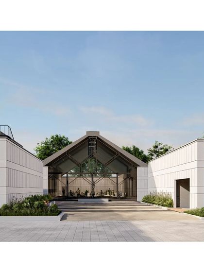 An exterior rendering of the Hoodi Convention Center, highlighting the modern, barn-like form of the main hall.