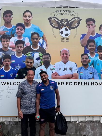 A player from Odisha FC with our club management. We believe in building strong relationships across the football community.