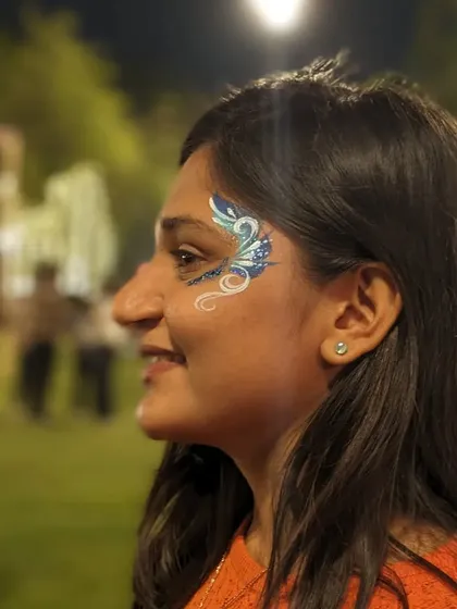 An elegant abstract design in blue and white with silver glitter, perfect for a sophisticated evening event.