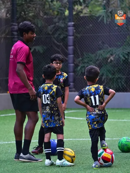 A coach gives instructions to our youngest players, building a strong foundation from the very beginning.
