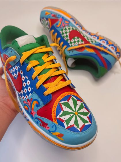 I created these vibrant Nike Dunks for the sitar maestro Rishabh Rikiram Sharma. The design is a fusion of various Indian cultural motifs, geometric patterns, and bright colours, reflecting his unique blend of music and culture.