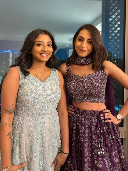 Beautiful sisters ready for a party. I created complementary looks for them, one with a soft, natural finish and the other with a touch of color on the eyes.