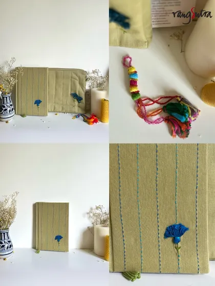 A closer look at one of our heartfelt gift sets, featuring a hand-embroidered journal and a colorful tassel charm. These small, practical keepsakes are made with patience and skill.