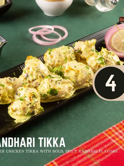 This is our Kandhari Tikka, featuring tender chicken with bold and spicy Kandhari flavours. It's a starter that packs a punch.