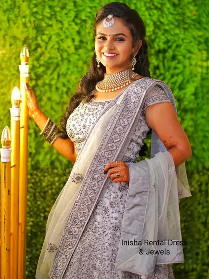 Look stunning at your reception in this elegant grey lehenga, paired with our beautiful white stone choker set. I also offer rental outfits, so you can get your complete look in one place.